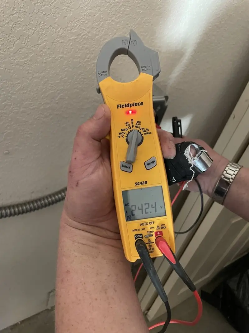 Voltage testing with clamp meter during Hot Tub / Pool Electrical Wiring in Ellsworth
